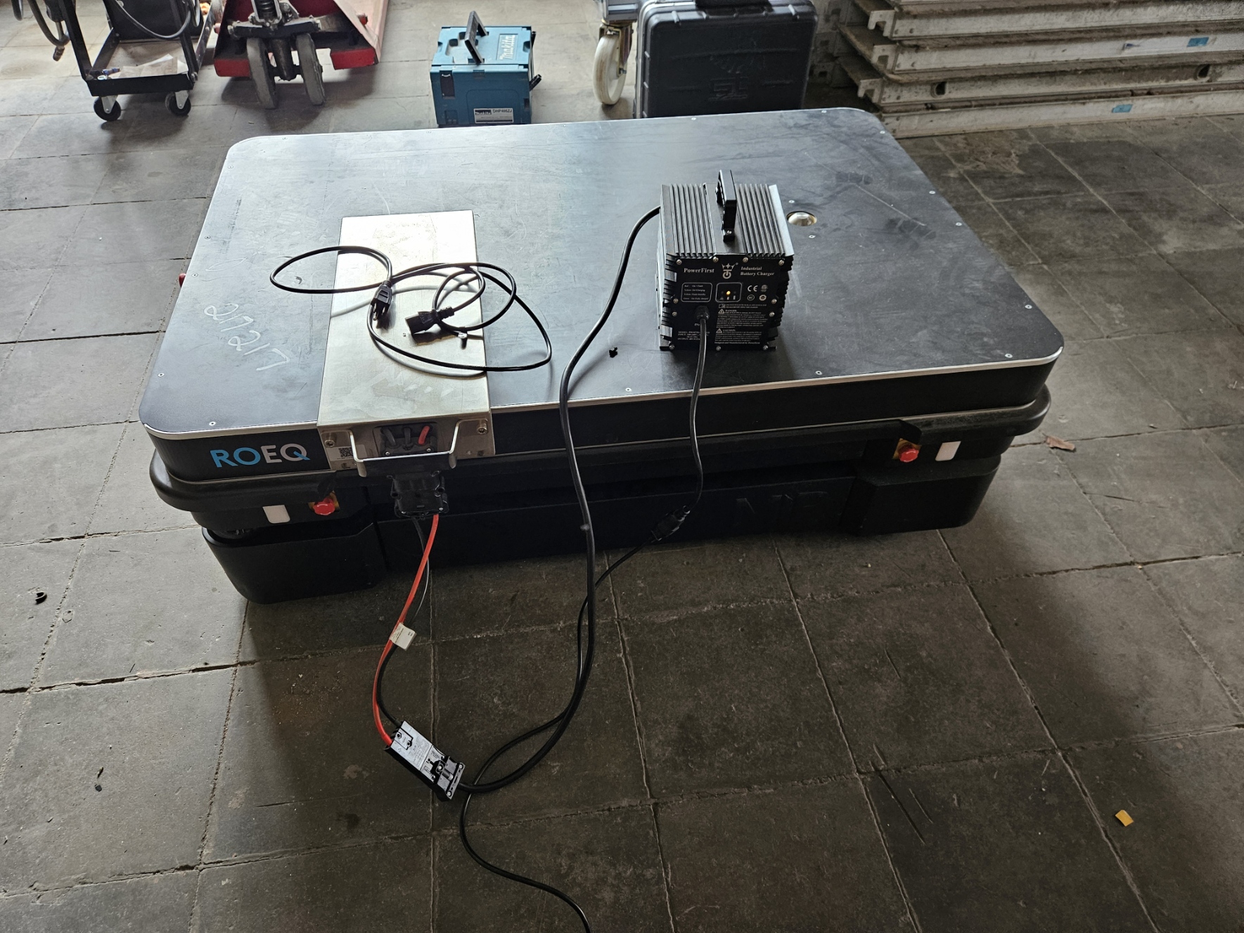 An autonomous mobile robot moving materials on a manufacturing floor